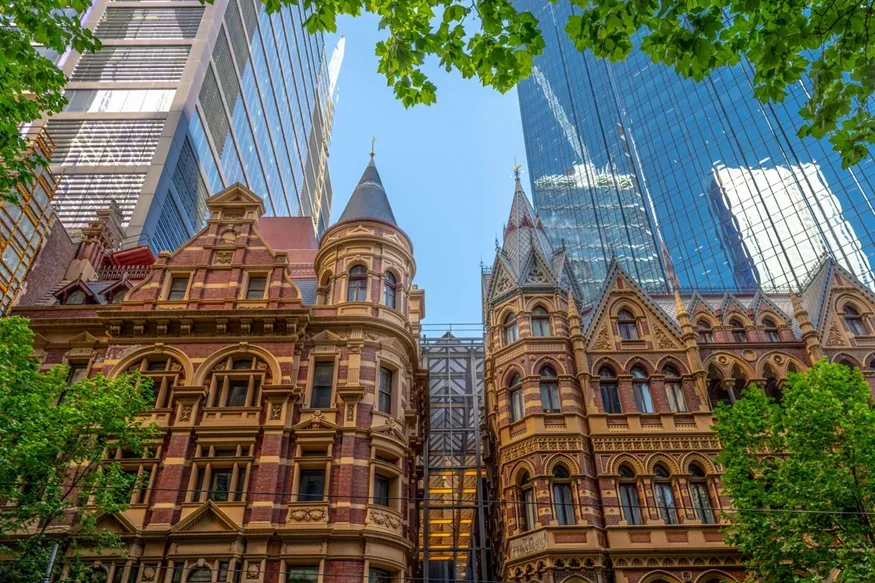 Heritage commercial buildings in front of modern glass office towers, Melbourne CBD