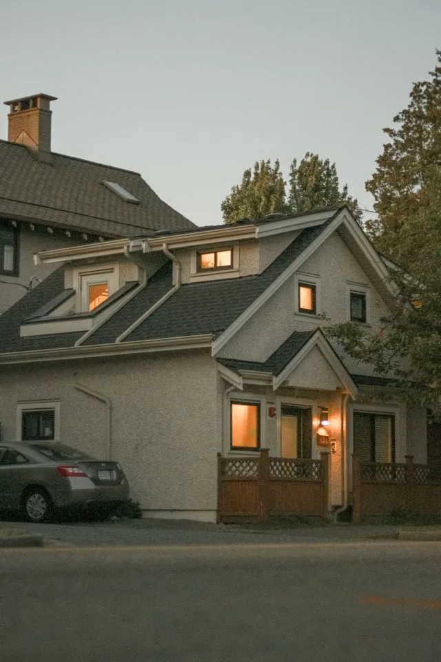 Established two-storey house exterior at dusk