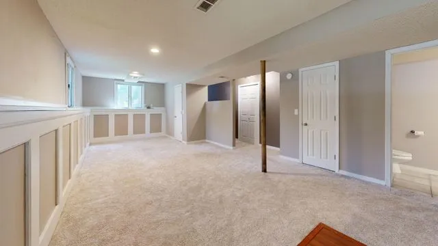 Carpeted interior of a residential investment property